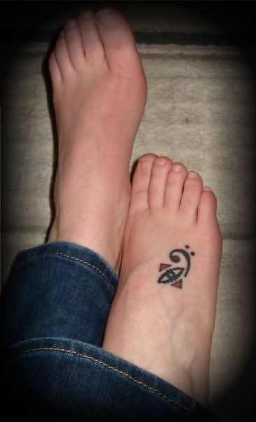 Yeah, girls have tattoos too, AND play the bass! This was my first tattoo, 